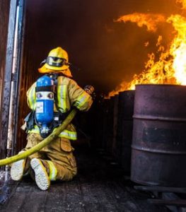 firefighter putting out a fire