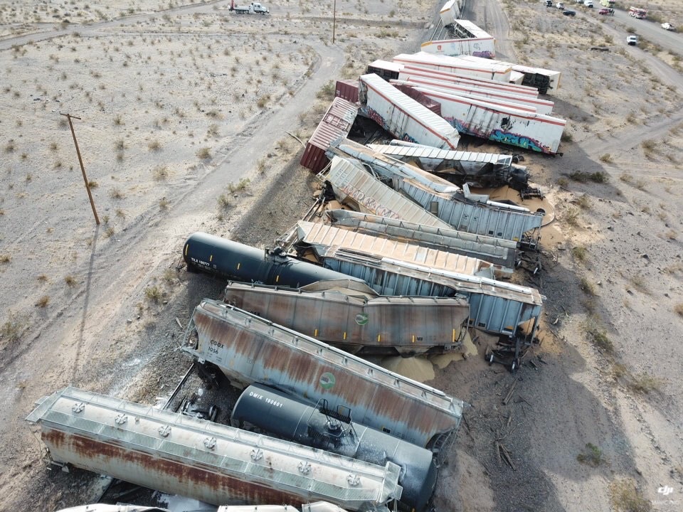over a dozen derailed containers