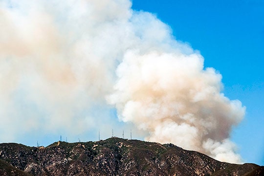 Firefighters battling 50-acre brush fire in Mount Baldy area prompted by vehicle fire